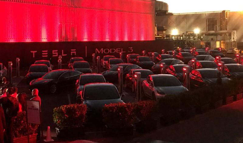 Tesla delivers record number of electric cars in quarter, shares up 8%