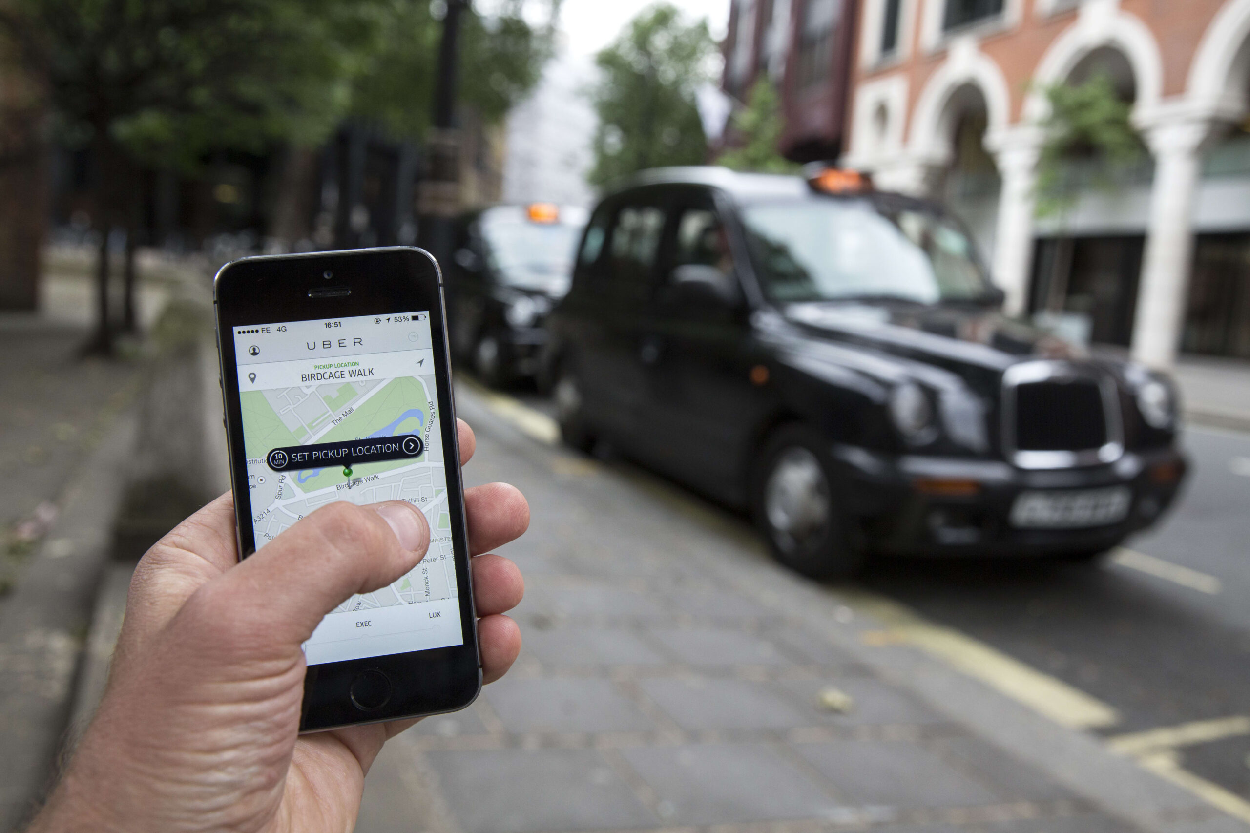 Uber adds new safety features in UK as London license decision nears